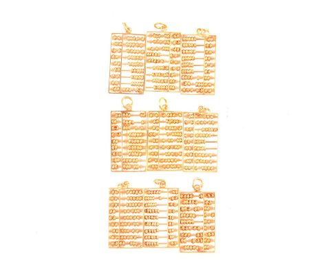 Nine yellow metal abacus pendants, all marked 14K 585, each 28x16mm, total 32.1g.Qty: 9