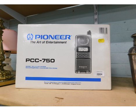 A boxed Pioneer PCC-750 vintage mobile phone.