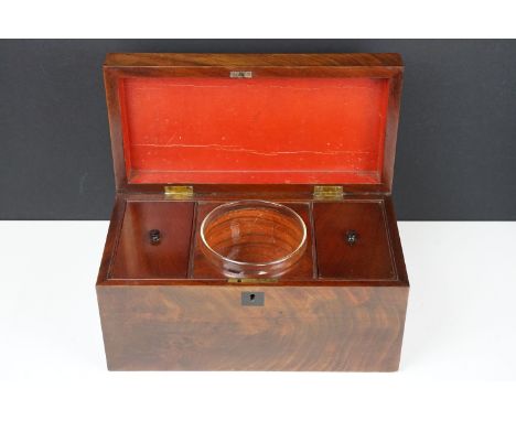 19th century mahogany tea caddy of rectangular form, the lid opening to a twin-compartment lidded interior with central glass