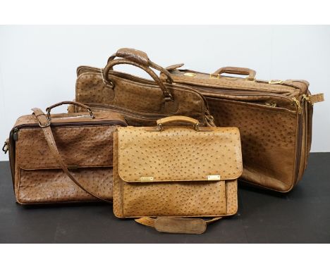 Four ostrich leather bags to include briefcase with shoulder strap, Giotto suitcase with strap, holdall and shoulder bag mark