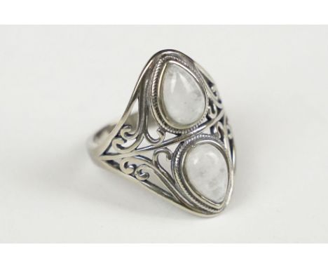 A 925 sterling silver and moonstone ladies ring set with two teardrop moonstones, marked 925 for sterling silver to the inner
