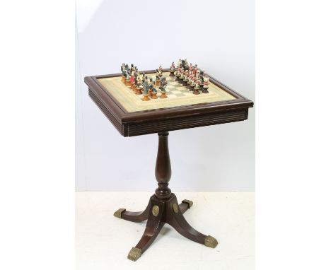 Franklin Mint The Raj Chess Set with marble effect chess board within a mahogany frame raised on a brass mounted pedestal bas