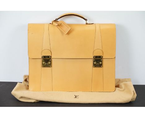 Louis Vuitton - Tanned leather briefcase with gold hardware and two compartments within. Measures 34 x 43cm. 