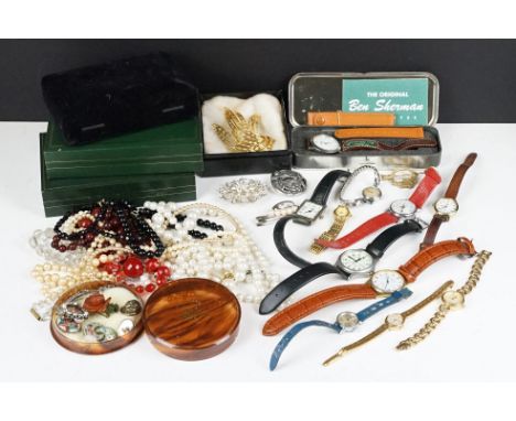 A small collection of vintage and contemporary costume jewellery together with a small group of wristwatches 