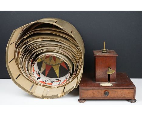 19th Century Goodchild's Trocheidoscpe by Horne &amp; Thornthwaite having an oak cased base with drawer housing coloured disc