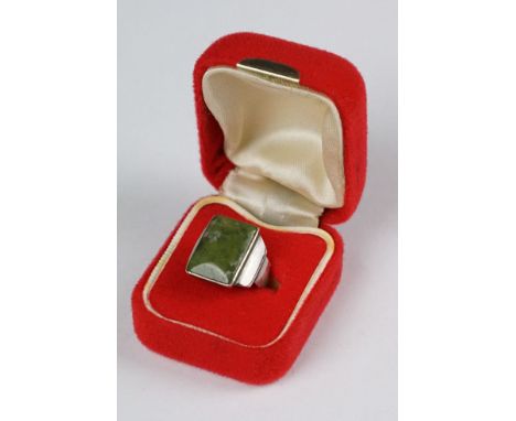 Silver and jade panelled front section of a ring 