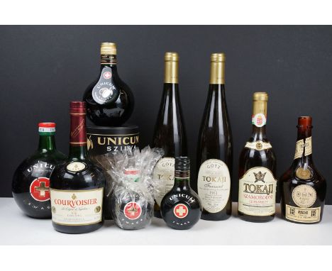 Collection of liqueurs to include three bottles of Unicum Zwack, Unicum Szilva, Courvoisier V.S. cognac, B and B liquer, Toka