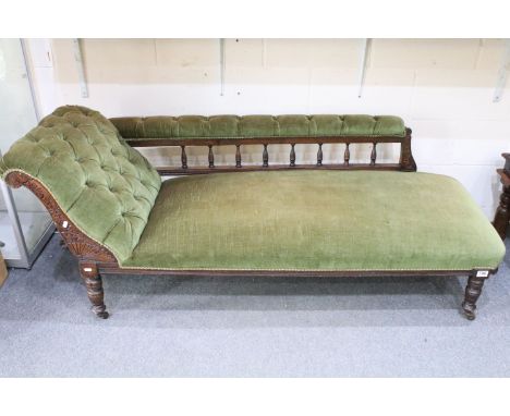 Edwardian mahogany chaise lounge, the galleried back with turned balustrades, the scroll end carved, with green button back u