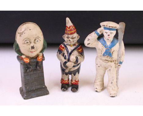 Three vintage painted cast iron money boxes to include Humpty Dumpty, saluting sailor &amp; clown. (Approx 14cm tall) 