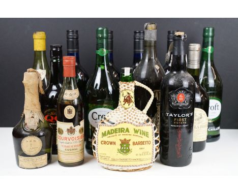 Collection of 14 bottles of wine and spirits to include Harvey's Bristol Cream, Courvoisier, D.O.M. Benedictine, Madeira wine