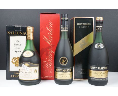 Three bottles of Cognac to include Remy Martin fine champagne cognac V.S.O.P. (2 boxed 70cl bottles) and a bottle of Salignac