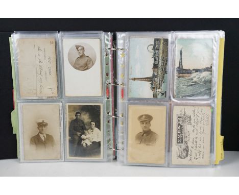 An album of First World War photographic postcards including a good selection of named soldier cards with war record document
