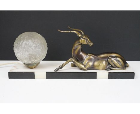 Art Deco Table Lamp mounted with an Antelope and globular glass shade on a marble plinth base, approx 45cm long 