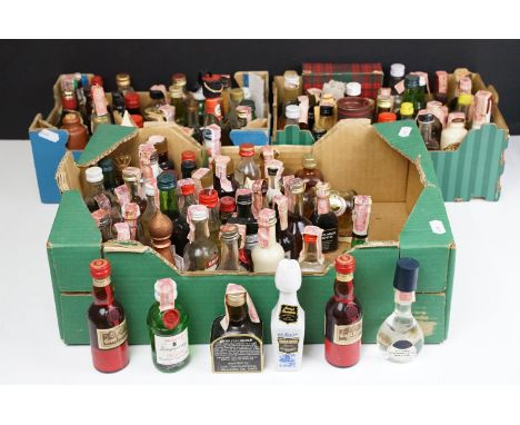 Collection of spirit miniatures to include whisky, gin, Harvey's Bristol cream, Kahlua, Remy Martin champagne cognac, Campari