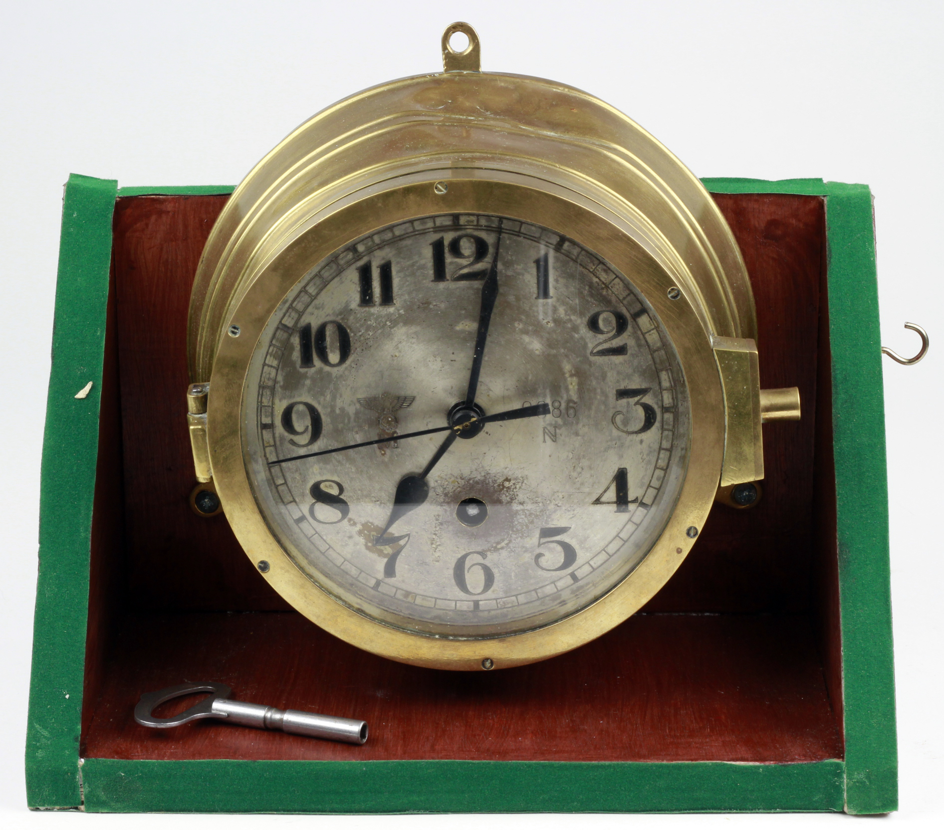 An original WWII Nazi naval U boat clock, with original face, backing