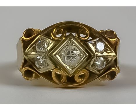 A Five Stone Diamond Ring, Modern, in gold coloured metal mount, set with a centre brilliant cut white diamond approximately 