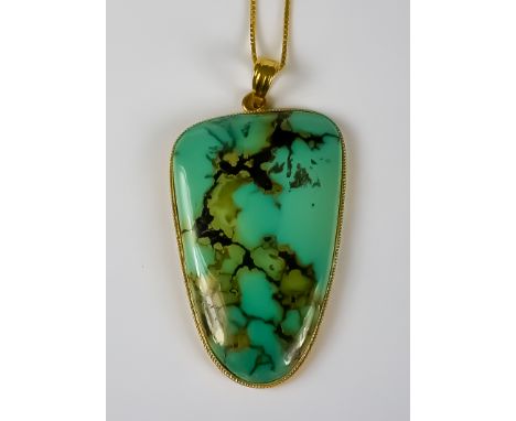 An 18ct Gold and Turquoise Pendant Necklace, Modern, 18ct gold mounted, set with a polished turquoise stone, 60mm x 32mm, sus