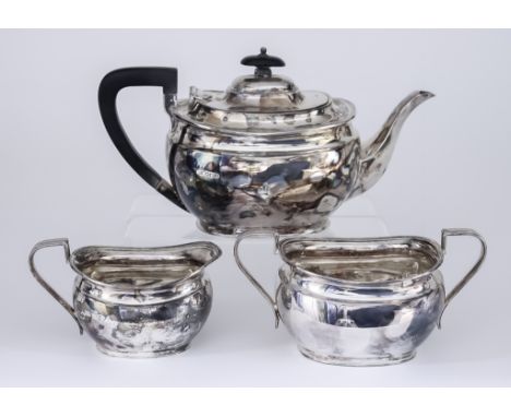 A George V Silver Three-Piece Tea Service of "Georgian" Design, by Atkin Brothers, Sheffield 1935, the rectangular slightly b