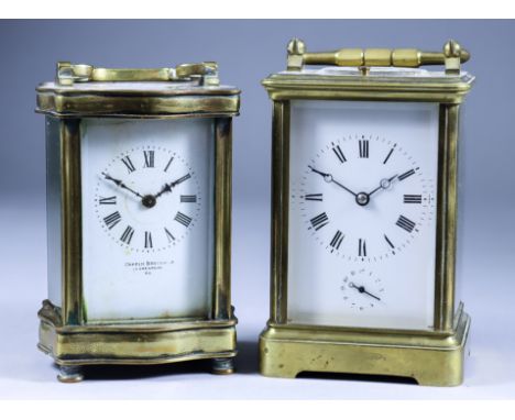 An Early 20th Century French Carriage Clock, and a Carriage Timepiece, the carriage clock with white enamel dial with Roman n