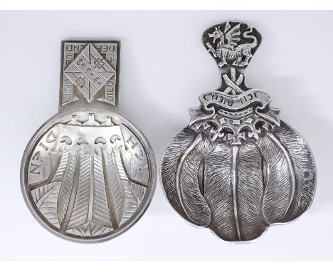 Two Elizabeth II Silver "Prince of Wales" Caddy Spoons, each by Garrard &amp; Co. Ltd, one with shaped bowl with Prince of Wa