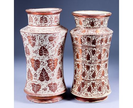 Two Spanish Hispano-Moresque Albarello, 19th Century, in 15th Century style, one with six horizontal bands of stylised ivy le