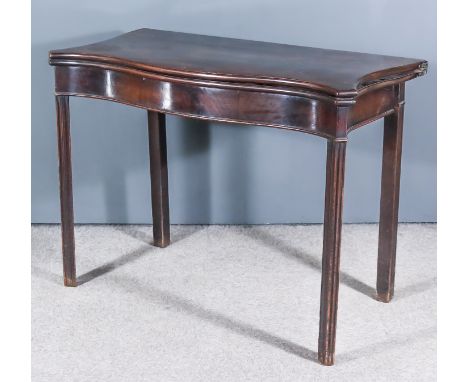 A George III Mahogany Concertina Action Serpentine Fronted Card Table, with green baize lined folding top, plain apron, on sq