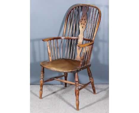 A 19th Century Ash and Elm Seated Wheelback Windsor Armchair, with two-tier stick back, on turned support and H-pattern stret