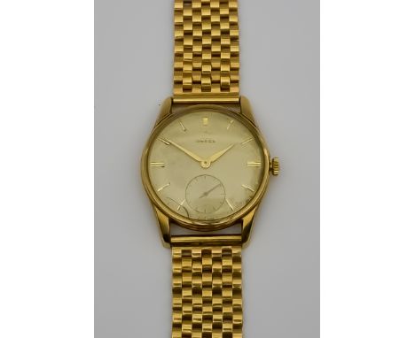 An Omega Manual Wind Wristwatch, 1950's, 9ct Gold Cased, 34mm diameter, the champagne dial with gold baton numerals, gold han