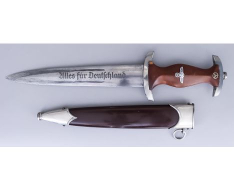 A German World War II NSKK Dagger, 8.5ins bright steel double edge blade engraved "ulles fur Deutschland" and RZ over M over 