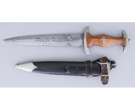 A German World War II NSKK Dagger, 8.52ins bright steel blade etched with "alles fur Deutschland, no visible maker's mark to 