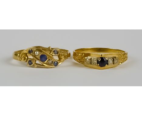 Two Sapphire and Diamond Rings, Modern, in 18ct gold mount, one set with a centre sapphire approximately .10ct, flanked by fo
