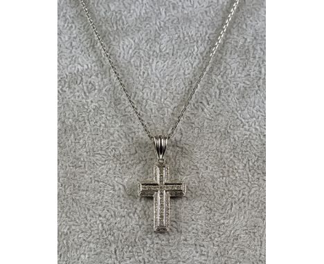 An 18ct White Gold Cross on Chain, Modern, the cross 37mm x 18mm, suspended from 480mm fine chain, gross weight 12.9g