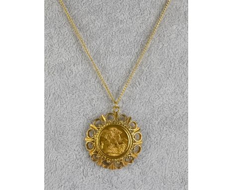 A George V 1915 Sovereign, in 9ct gold pendant mount with open loop borders, and 9ct gold 500mm fine chain necklet for same, 