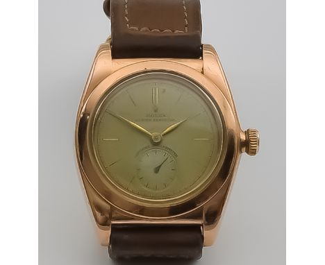A Rolex Oyster Perpetual Automatic Wristwatch, 14ct Gold Cased, 32mm diameter, Serial No.400026, certified chronometer, Case 