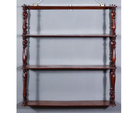 A Victorian Mahogany Four-Tier Wall Shelf, with slender turned uprights, 25ins wide x 6.5ins deep x 27ins high