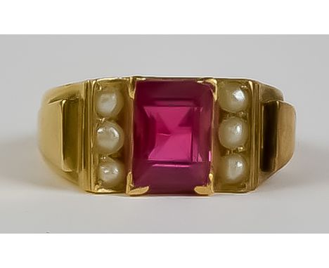 A Ruby and Pearl Set Ring, Modern, gold coloured metal mounted, set with a centre faceted ruby, approximately 1.00ct, flanked