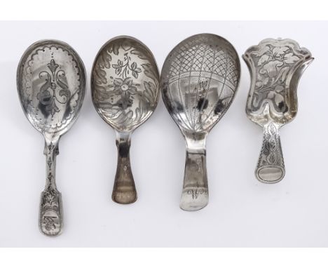 A George III Silver Caddy Spoon and Three Other Silver Caddy Spoons, the George III spoon, by John Taylor, Birmingham 1818, w