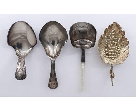 Four George III Silver Caddy Spoons, one cast silver gilt vine and fruiting leaf pattern spoon, probably Birmingham 1808, wit