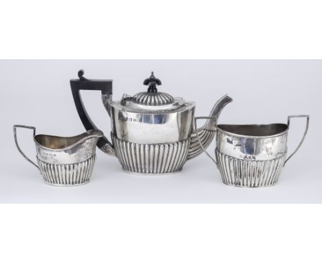 A Late Victorian/Edwardian Bachelors Silver Oval Three-Piece Tea Service, by George Unite, Birmingham 1900-1901, with part re
