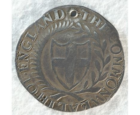 Commonwealth, 1653 shilling, 5.73 grams, 30.8mm, 5h, mintmark sun. Obv: Shield with St. George's cross on inside a wreath. Re