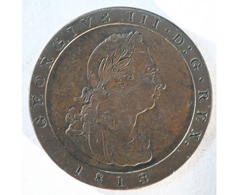 Isle of Man, George III 1813 penny. Obv: Laureate head facing right. Rev: Triskelis. S. 7415. Near Extremely Fine with an esp