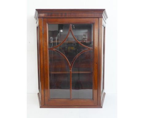 A late 19th / early 20th century mahogany display cabinet of unusual proportions: three-quarter galleried top above a five-pa