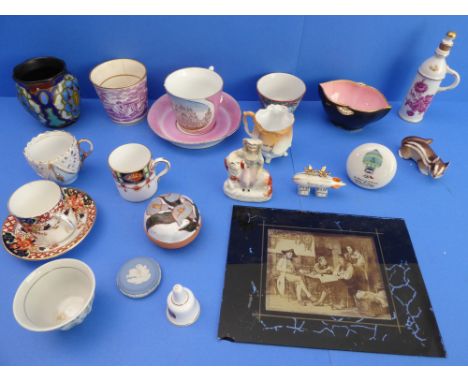 An interesting selection of 19th to early 20th century ceramics to include:a late 19th century souvenir of Worthing modelled 