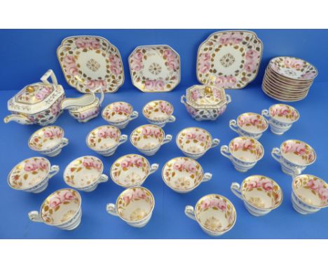 A large and extensive early 19th century Spode tea service, each piece decorated in enamels with pink roses, painted red Spod