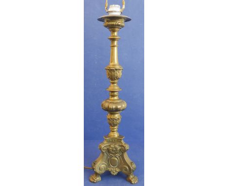 A large and heavy brass pricket stick style table lamp and shade on triform base (approx. 88cm high including shade)