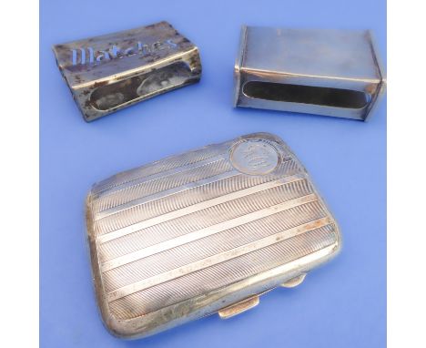 A silver cigarette case and two matchbox-holders:the early 20th century hallmarked silver kidney-shaped cigarette case with e