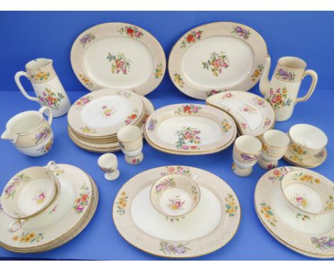 An early 20th century Cauldon China part tea service (pattern 4645) decorated with floral sprays and with gilded edges:3 oval