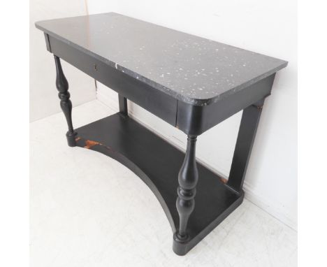 An early 19th century marble-topped continental console table: the white flecked black marble top above a single full-width d