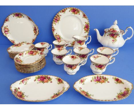 A Royal Albert 'Old Country Roses' bone china tea service comprising:a large teapot (20 cm high);eight side plates;seven cups