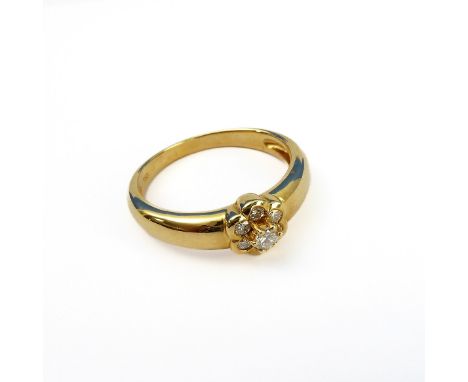 An 18-carat gold seven diamond cluster ring,&nbsp;ring size P/Q